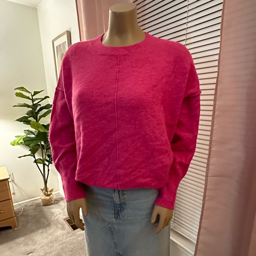 Vince Camuto’s ladies scoop neck sweater